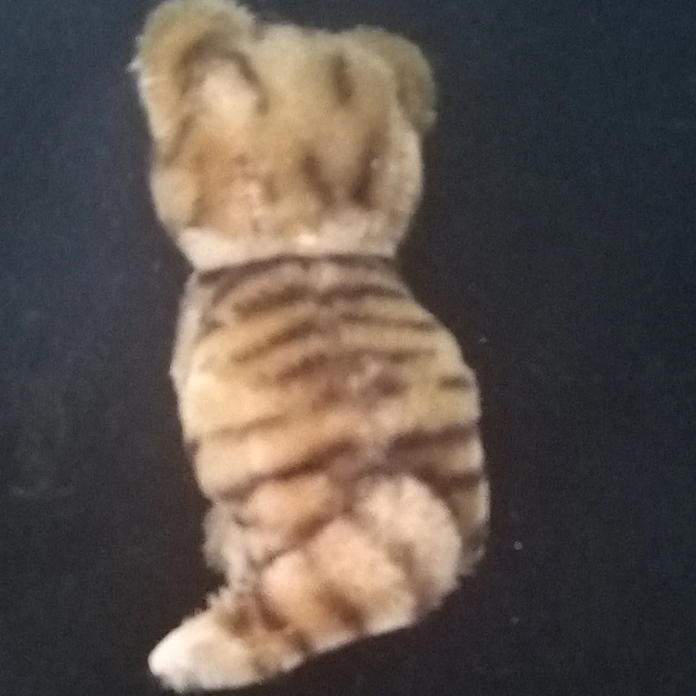 This item is a vintage Steiff Seated Tiger Cub, manf in Germany 1959 - 1961